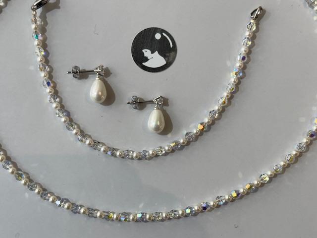 PUCES ARGENT RHODIE ZIRCONS 04mm + POIRES 07x10mm PPL